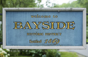 sign welcoming visitors to Bayside's historic district